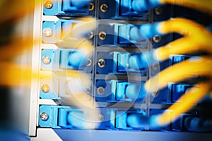 Fiber Optic cables connected to optic ports