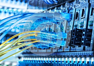 Fiber Optic cables connected to an optic ports and cable