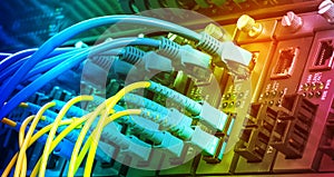 Fiber Optic cables connected to optic ports and UTP