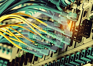 Fiber Optic cables connected to optic ports and UTP