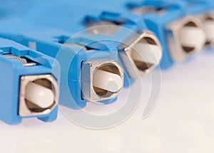 Fiber optic cables isolated over the grey background