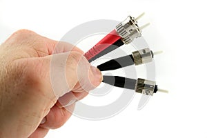 Fiber Optic Computer Cable held in the Hand