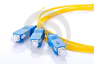 Fiber optic coupler with SC connectors on white background