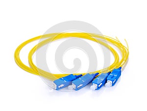 fiber optic coupler with SC connectors on white background.