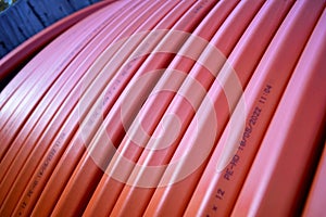 Fiber optic, empty conduits cables on roll for data transfer, close up shot