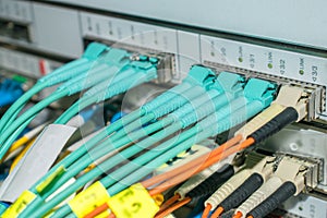 Fiber-optic Internet wires are connected to the central router. High-speed Internet connection. The routing server is in the data