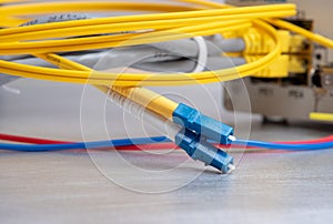 Fiber optic and network ethernet patch cord cable connect to the switch