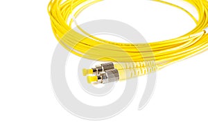 Fiber optic patch cord on white background