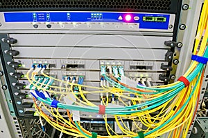 Fiber-optic wires are connected to a central router. The backbone server of the Internet provider. Powerful computer equipment is