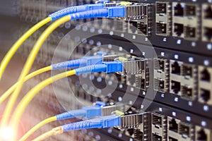 Fiber-optic wires are connected to the Internet switch module. Server hardware datacenter. The concept of high-speed data transfer