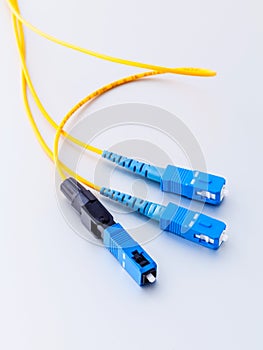 Fiber Optics connectors symbolic photo for fast internet.