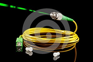 Fiber optics path cord on the black background