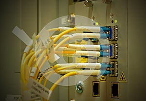 Fiber Optics with SC/LC connectors. Internet Service Provider equipment. Focus on fiber optic cables. Data Network Hardware