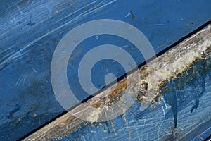 Fiberglass Crack Repair on a Blue Boat Hull