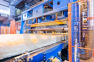 Fiberglass production industry equipment at manufacture background