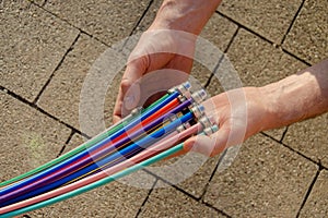 fibre optic cable in the hands of a man