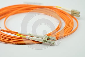 Fibre optical patch cord with plugs isolated on white background
