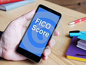 FICO Score is shown on the business photo using the text