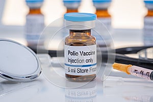 A fictional Polio vaccine vial with stethoscope and syringe