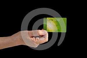 Fidelity card written in French on a card held by hand. Isolated. photo