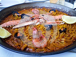 Fideua shellfish paella typical Valencias cuisine photo