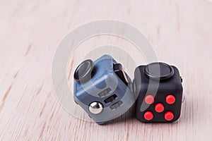 Fidget cube, the stress relieving cube on table top