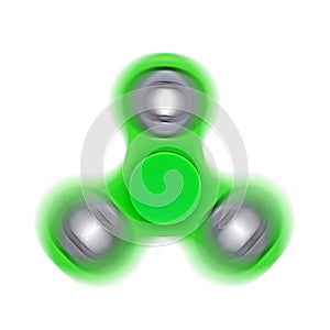 Fidget finger spinner in move, green anti stress toy isolated on white photo