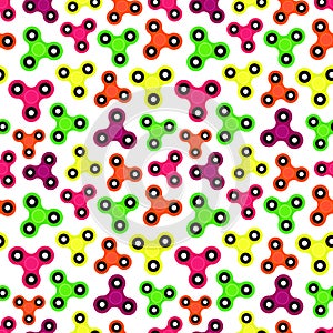 Fidget spinner. Hand toy for stress relief. Seamless pattern with colorful spinners for wrapping paper, wallpaper, web