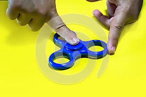 fidgeting hand toy rotating on child's finger