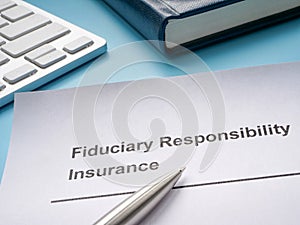 Fiduciary responsibility insurance policy and pen.