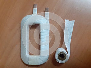 Field coil wire has tapped using cotn tape