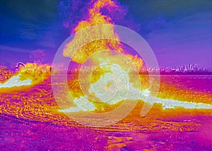 Field fire seen by thermal camera