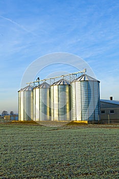 Field in harvest with silo