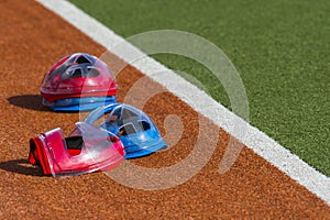 Field hockey equipment on green grass