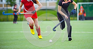 Field Hockey player, ready to pass the ball to a team mate