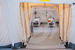 Field hospital tent with beds