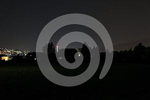 Field and Houses at Night