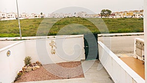 field and housing in a spanish urbanisation area