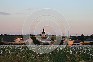 Field with Kostel svateho Augustina in Strahovice village North Moravia, Silesia, Czech republic