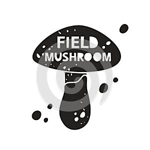 Field mushroom grunge sticker. Black texture silhouette with lettering inside. Imitation of stamp, print with scuffs