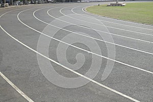 Field running track at the stadium with lines on the field, outdoor soccer field, sports