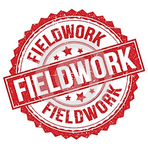 FIELDWORK text on red round stamp sign