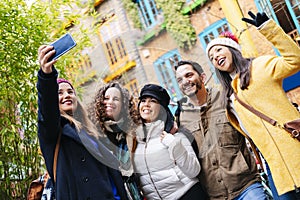 Fiends take a selfie with the mobile phone in London