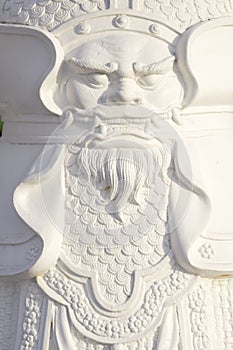 Fierce face on a Chinese god statue