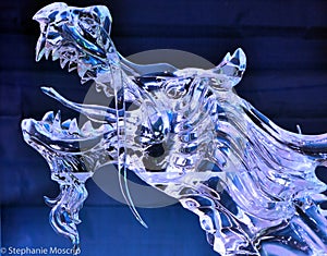 Fierce Roaring Dragon Ice Sculpture with blue backgroud