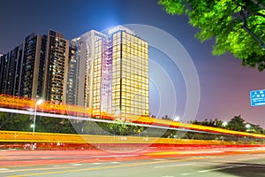 Fiery light trails on the city road