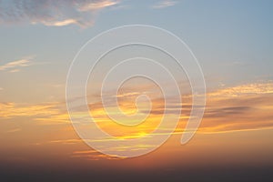 Fiery orange summer dramatic sunset or sunrise cloudscape