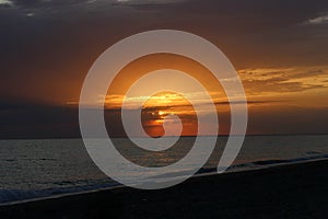 Fiery red sunset over the sea