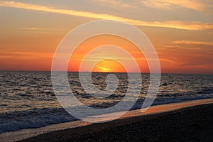 Fiery red sunset over the sea