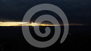 Fiery Sunrise Behind Storm Clouds Timelapse